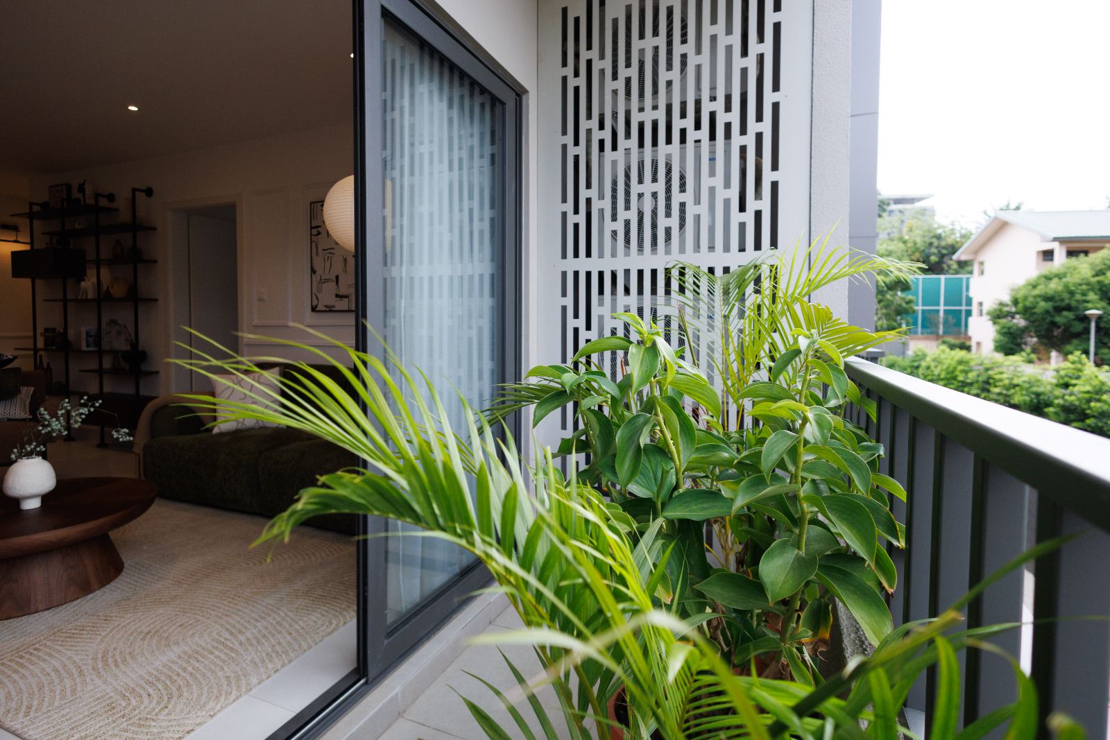 Balcony plants and view into living room